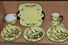 A TWENTY ONE PIECE ART DECO GRIMWADES ATLAS CHINA PART TEA SET IN 'SWALLOWS' PATTERN, decorated with