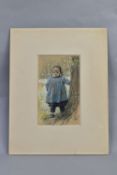 GEORGE HENRY BOUGHTON (1833-1905) CHILD WEARING A BLUE SMOCK, a portrait of a young boy standing