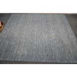 A LARGE MODERN NOURISON BLUE RUG, 320cm x 244cm, a modern cream rug, and a floral carpet runner (
