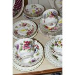 TWENTY FIVE PIECES OF ROYAL ALBERT 'FLOWERS OF THE MONTH' TEAWARE, comprising in Christmas Rose