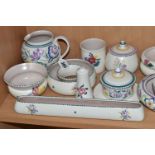 A COLLECTION OF POOLE POTTERY TRADITIONAL WARE, over thirty pieces to include posy rings, preserve