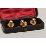 A BOXED SET OF THREE 9CT GOLD DRESS STUDS, each of a polished design, hallmarked 9ct Chester,