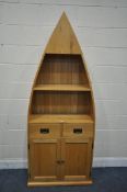 A SOLID OAK BOAT BOOKCASE, with two drawers and double panelled cupboard doors, width 84cm x depth