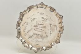 AN ELIZABETH II SILVER SALVER, FOLIATE CAST AND PIE CRUST BORDER, the centre engraved with