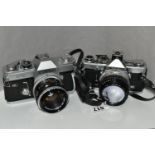 TWO VINTAGE CAMERAS, comprising an Olympus OM-1N camera with an Olympus OM-System Zuik50mm lens,