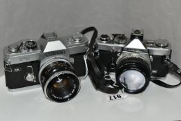 TWO VINTAGE CAMERAS, comprising an Olympus OM-1N camera with an Olympus OM-System Zuik50mm lens,