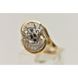 A YELLOW METAL DIAMOND RING, cross over style, the three centre stones are missing, cross over