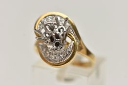 A YELLOW METAL DIAMOND RING, cross over style, the three centre stones are missing, cross over
