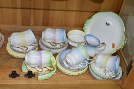 A THIRTY THREE PIECE ROYAL ALBERT 'RAINBOW' PART TEA SET, comprising a cake plate, a cream jug, a