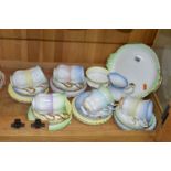 A THIRTY THREE PIECE ROYAL ALBERT 'RAINBOW' PART TEA SET, comprising a cake plate, a cream jug, a