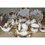 ROYAL ALBERT 'OLD COUNTRY ROSES' PATTERN TEAWARE, comprising teapot (broken and reglued spout), milk