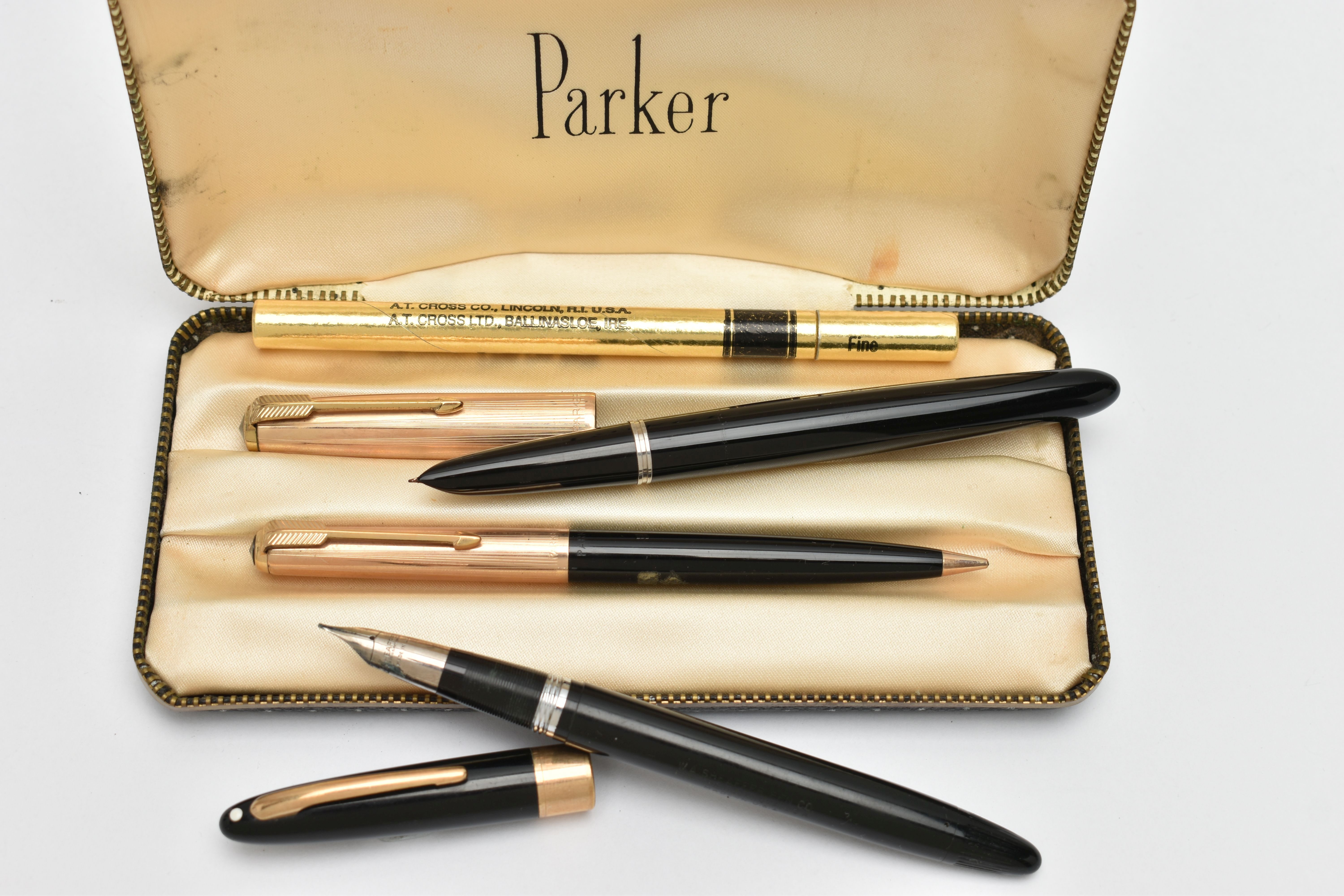 A CASED 'PARKER' SET AND A SHEAFFER PEN, a matching fountain pen and pencil set signed 'Parker'