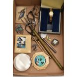 A BOX OF COLLECTABLES AND COSTUME JEWELLERY, including an Elizabeth II silver engine turned compact,
