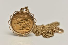 A HALF SOVEREIGN COIN PENDANT NECKLACE, Edward VII half sovereign, dated 1903, in a collet mount