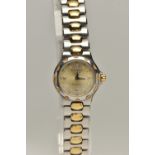 A LADYS 'LONGINES' WRISTWATCH, round gold dial signed 'Longines Conquest', Arabic twelve, three, six