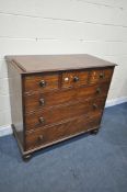 A GEORGIAN MAHOGANY CHEST OF THREE SHORT OVER THREE LONG GRADUATED DRAWERS, with turned handles, and