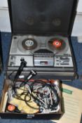 A GRUNDIG TK144 REEL TO REEL TAPE RECORDER WITH INSTRUCTIONS AND A BOX OF CABLES, MICROPHONES,