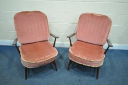 A PAIR OF ERCOL WINDSOR ARMCHAIRS, with loose pink cushions (condition report: -overpainted/stained,