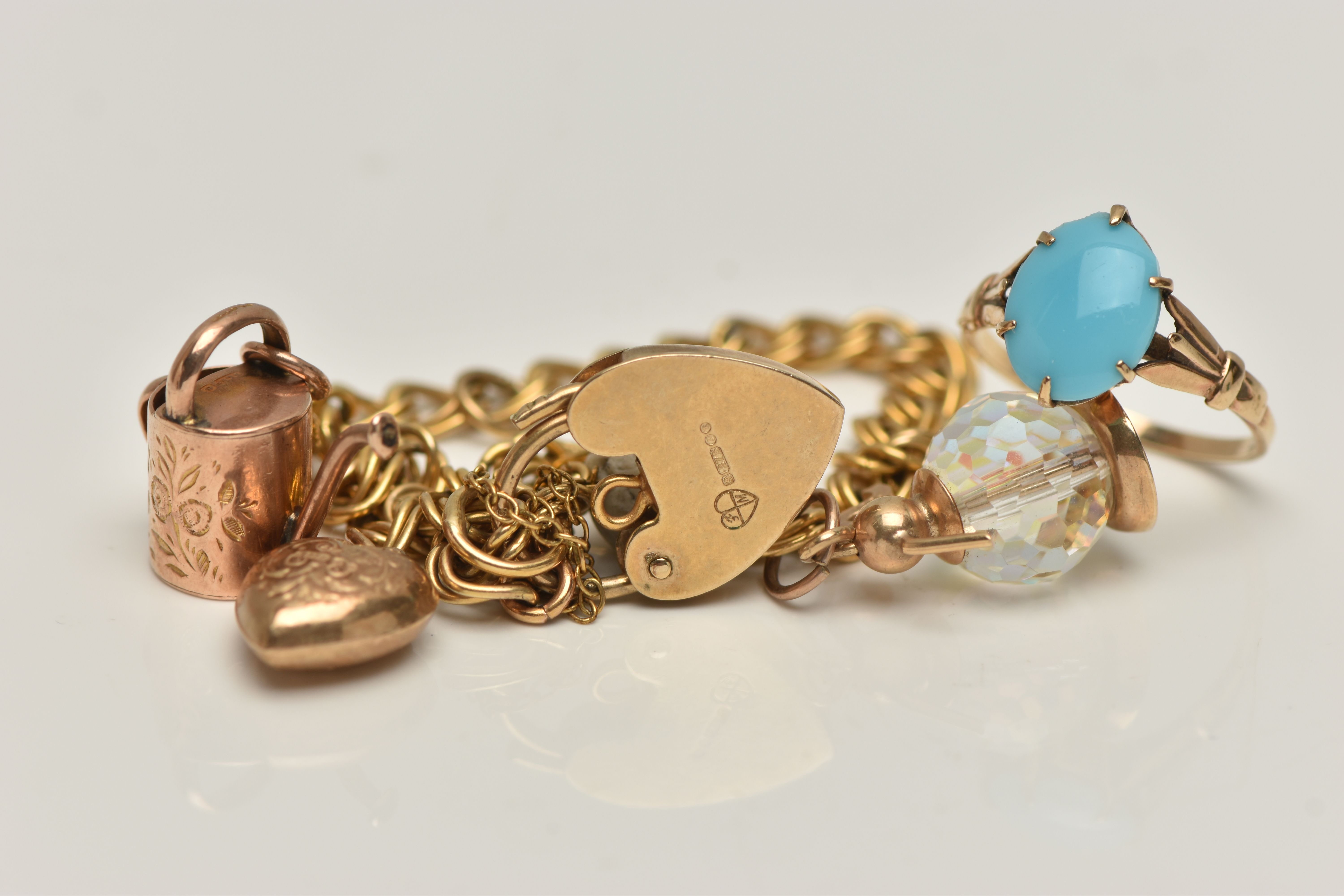 A 9CT GOLD CHARM BRACELET AND A TURQUIOSE RING, double link bracelet, fitted with three charms to - Image 2 of 3