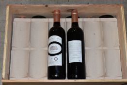 WINE, one opened case containing eight bottles of CHATEAU ROUSSEAU DE SIPIAN 2005 Medoc