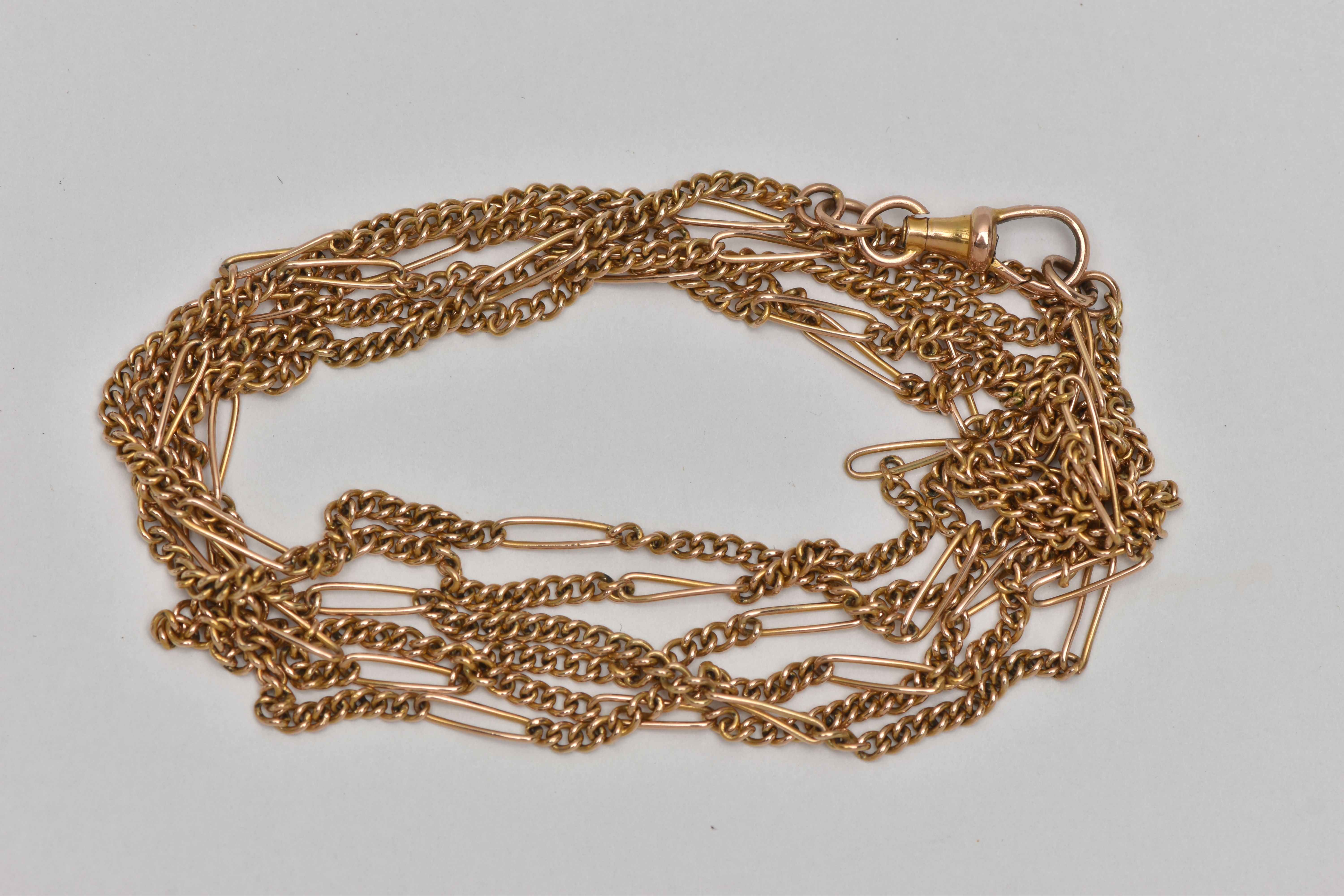 A LONG FINE YELLOW METAL FIGARO CHAIN, fitted with a lobster clasp, stamped 9ct, length 1340mm,