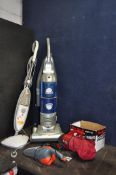 AN ELECTROLUX PET LOVER UPRIGHT VACUUM CLEANER, a Dirt Devil vacuum, a Vax Steam mop (all PAT pass