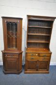 AN REPRODUCTION OAK DRESSER, with fielded panels, width 89cm x depth 43cm x height 193cm x height of