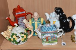 FIVE NOVELTY TEAPOTS, comprising a Sadler Championships 'A Round of Golf' teapot (some chipping