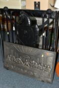 A MODERN CAST METAL WALL PLAQUE AND FIREGUARD, comprising a cast metal plaque of 'The Last