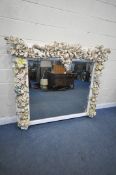 A LARGE 19TH CENTURY OVERMANTEL MIRROR, in the manner of Grinling Gibbons, the frame decorated