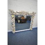 A LARGE 19TH CENTURY OVERMANTEL MIRROR, in the manner of Grinling Gibbons, the frame decorated