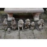 SEVEN VARIOUS COMPOSITE GARDEN FIGURES, to include owls, ducks, dogs, etc (condition - weathered) (
