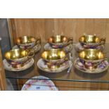 SIX AYNSLEY 'ORCHARD GOLD' TEACUPS AND SAUCERS, each cup with gilt interior, handle and foot,