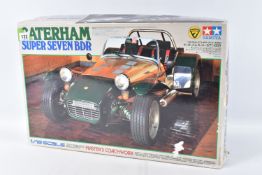 A BOXED UNBUILT TAMIYA CATERHAM SUPER SEVEN BDR 1:12 SCALE MODEL VEHICLE, numbered 10201 19800,