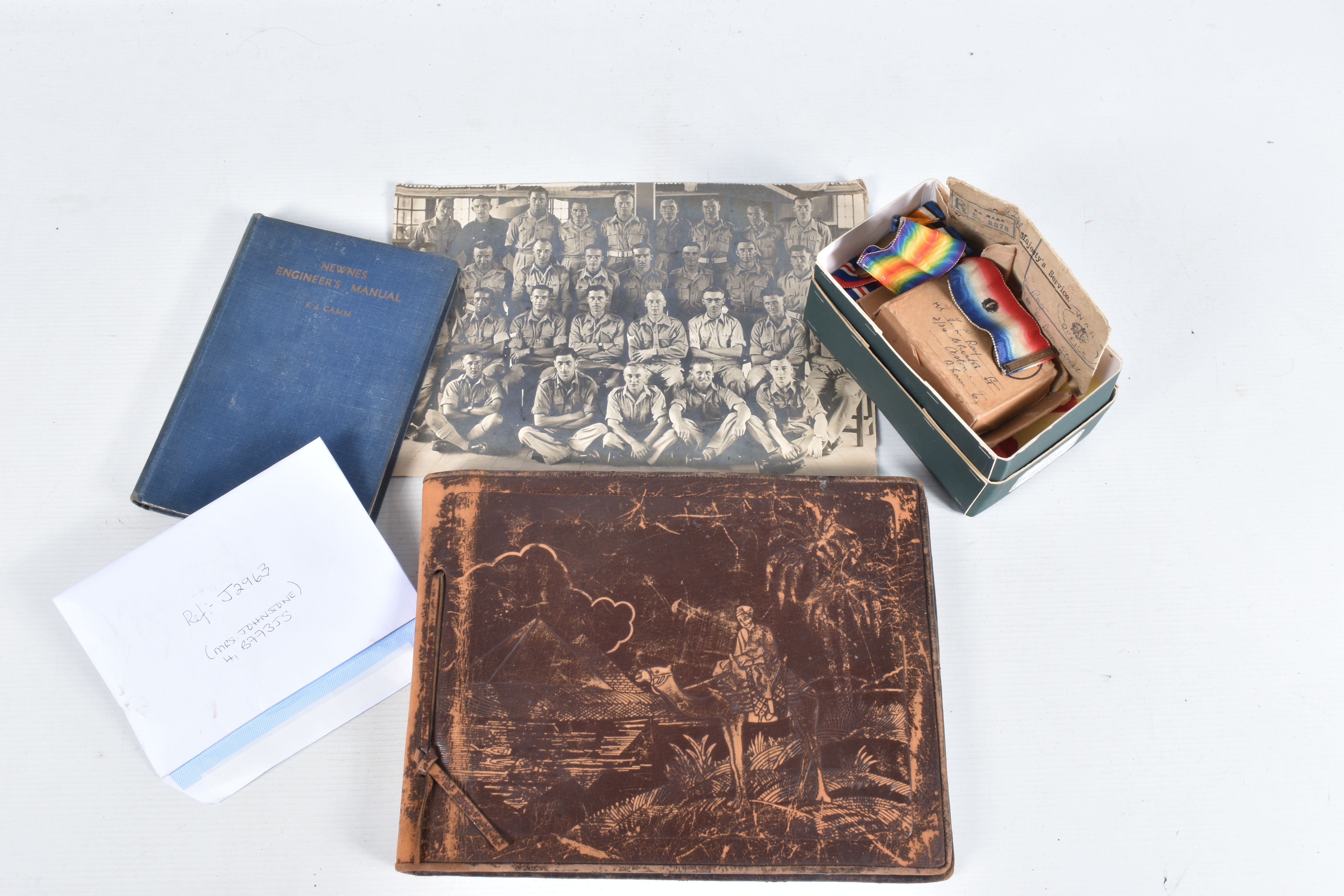 AN INTERESTING FAMILY GROUP OF WWI AND WWII MEDALS AND PHOTOGRAPHS, the medals consist of a 1914