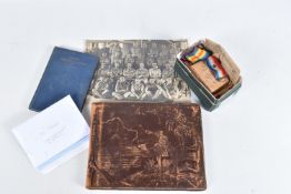 AN INTERESTING FAMILY GROUP OF WWI AND WWII MEDALS AND PHOTOGRAPHS, the medals consist of a 1914