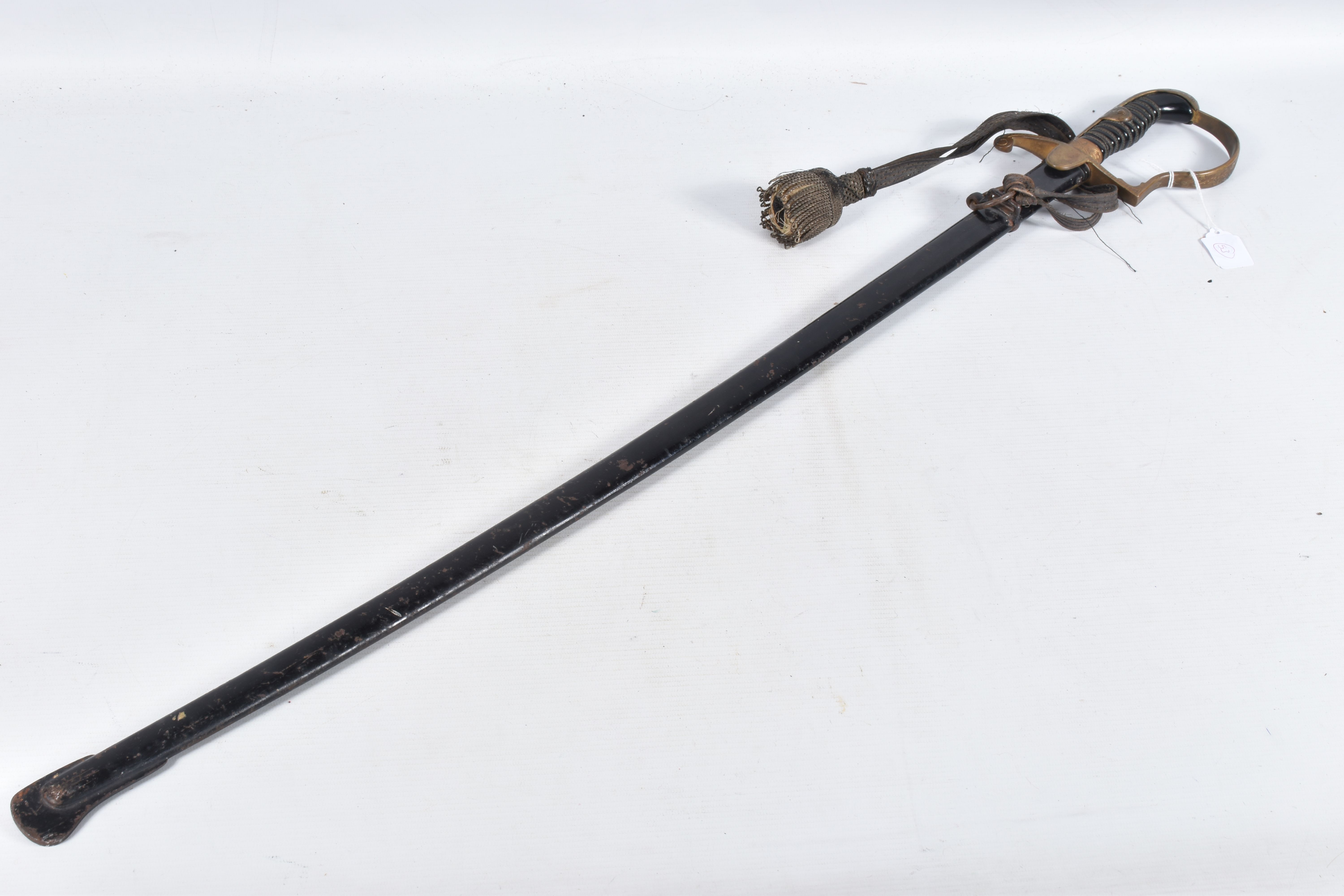 A GERMAN ARMY OFFICERS SWORD MADE BY WKC, the blade is un-etched, the knights head and WKC makers