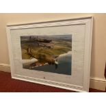 A FRAMED PRINT OF THE BATTLE OF BRITAIN MEMORIAL FLIGHT OVER BEACHY HEAD