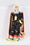 A LARGE CLOWN PUPPET, carved and painted wooden head, wooden body, has some minor wear and appears