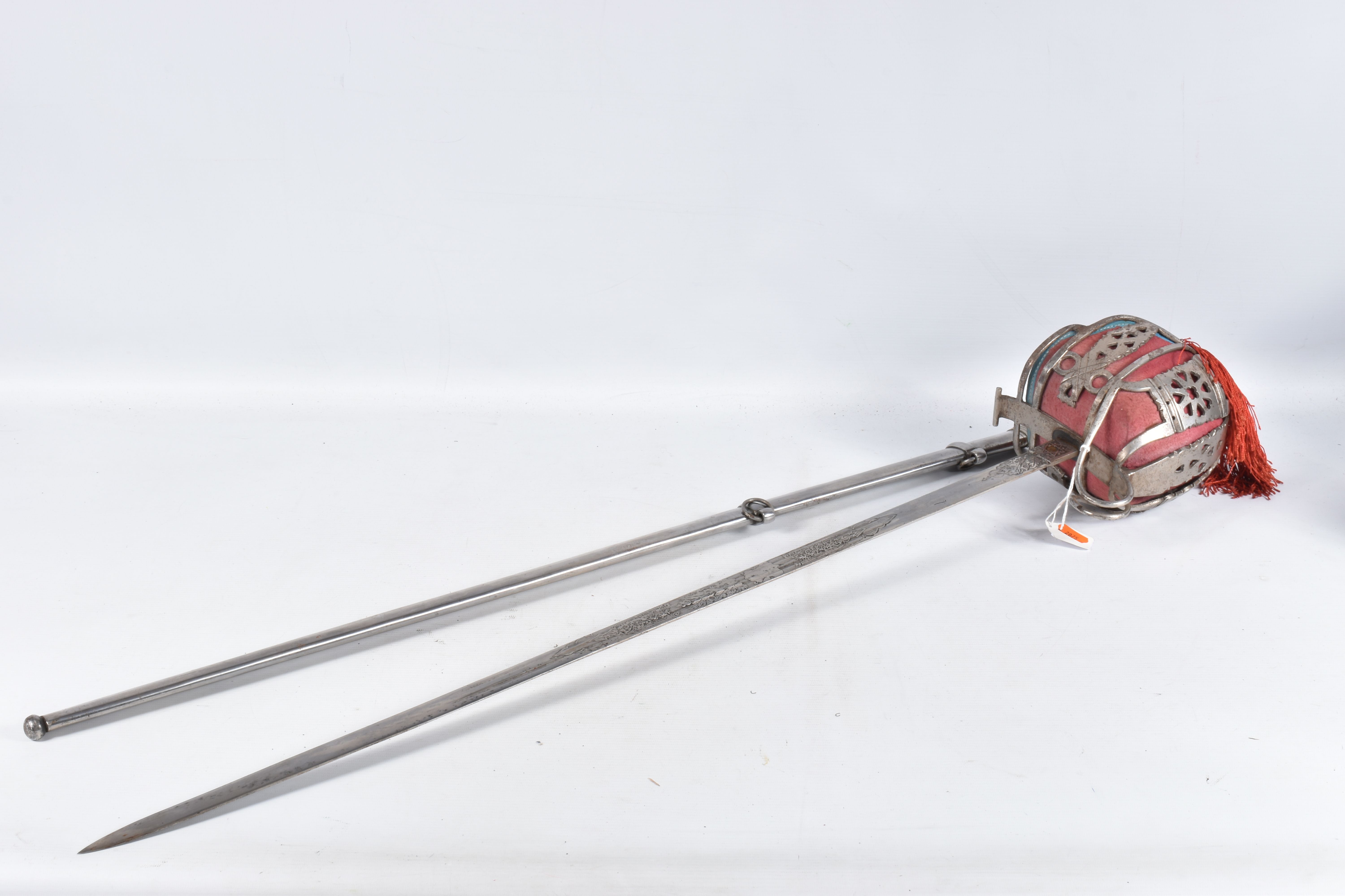 A SCOTTISH OFFICERS BASKET HILT SWORD, the blade has got ornate decoration on it but this is