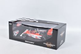 A BOXED MINICHAMPS MCLAREN FORD M23 WORLD CHAMPION 1976 SCALE 1:18 MODEL VEHICLE, numbered 186