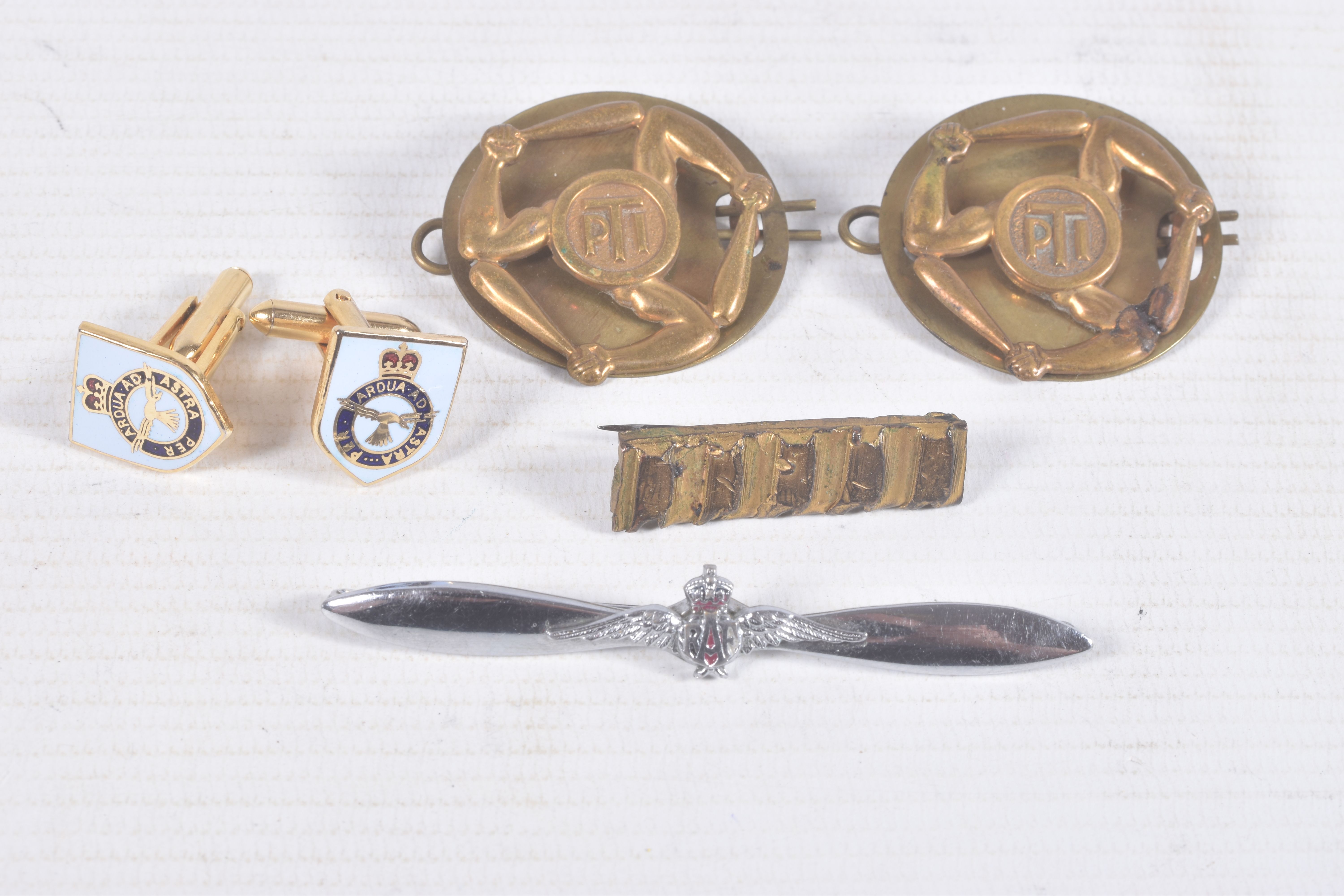 A PAIR OF RAF PHYSICAL TRAINING INSTRUCTOR ARM GADGE, RAF cuff links and a broach, the PTI badges