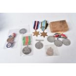 A COLLECTION OF WWII MEDALS AND BADGES ETC, this lot includes an empty WWII Royal Navy medal box,