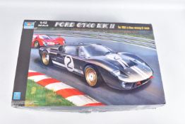 A BOXED TRUMPETER 1:12 SCALE FORD GT40 MK II UNBUILT MODEL VEHICLE, numbered 05403 contents