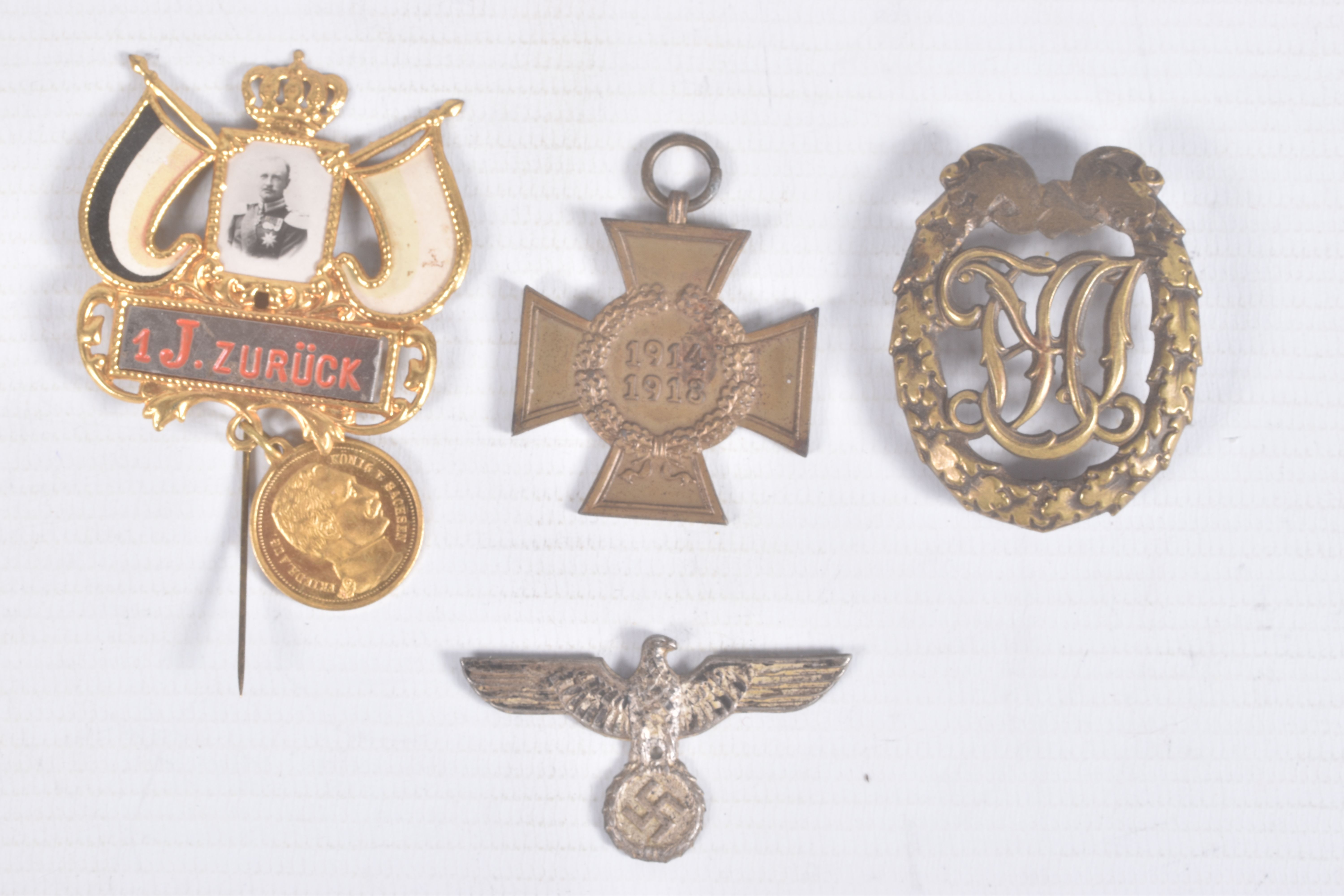 FOUR GERMAN WWI AND WWII ERA BADGES, this lot includes a WWII Hindenburg cross without swords, a WWI - Image 2 of 13