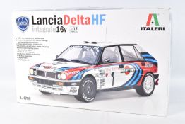A BOXED UNBUILT ITALERI LANCIA DELTA HF INTEGRALE 16V 1:12 SCALE MODEL RALLY CAR, numbered 4709, all