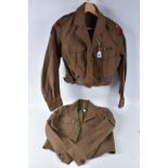 TWO BRITISH BATTLEDRESS BLOUSE JACKETS, the first is a 1949 pattern blouse with a date of 1951 on