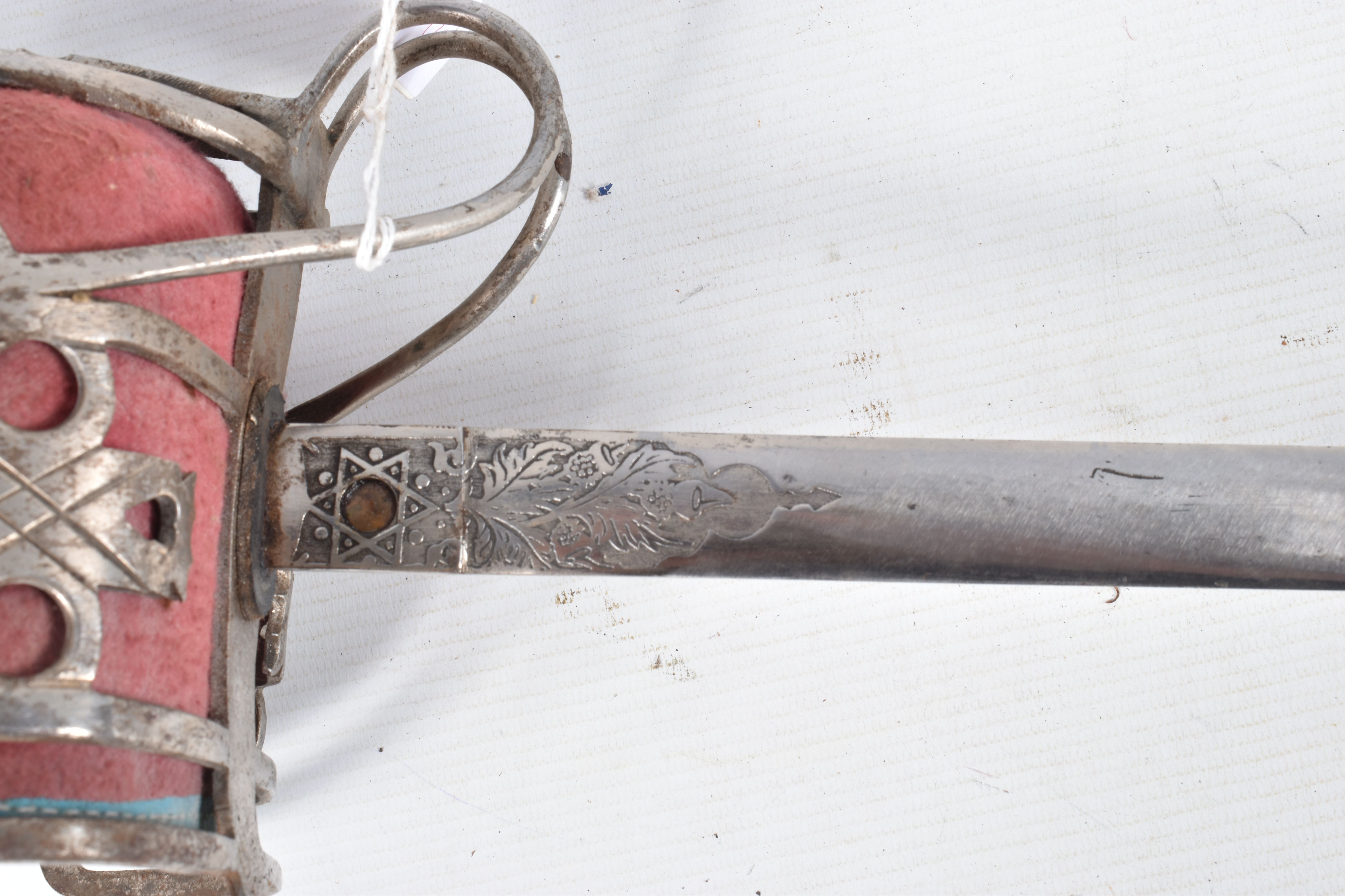 A SCOTTISH OFFICERS BASKET HILT SWORD, the blade has got ornate decoration on it but this is - Image 28 of 33