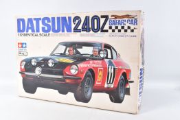 A BOXED UNBUILT TAMIYA DATSUN 240 Z SAFARI CAR 1:12 SCALE MODEL VEHICLE, numbered BS1208 3500, model