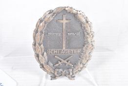 A WWI OR POST WAR FREIKORP SCHLAGATER BADGE, it is constructed from silvered bronze and the front